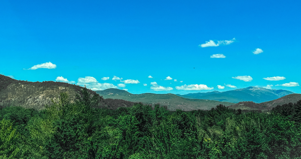 The mountains, trees, and sky in Jackson, NH