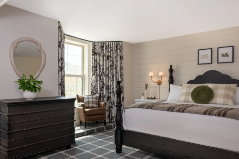 Bed with wall decor and furniture